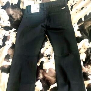 Kancan Los Angeles black distressed mid-rise jeans still has tags. Never worn.